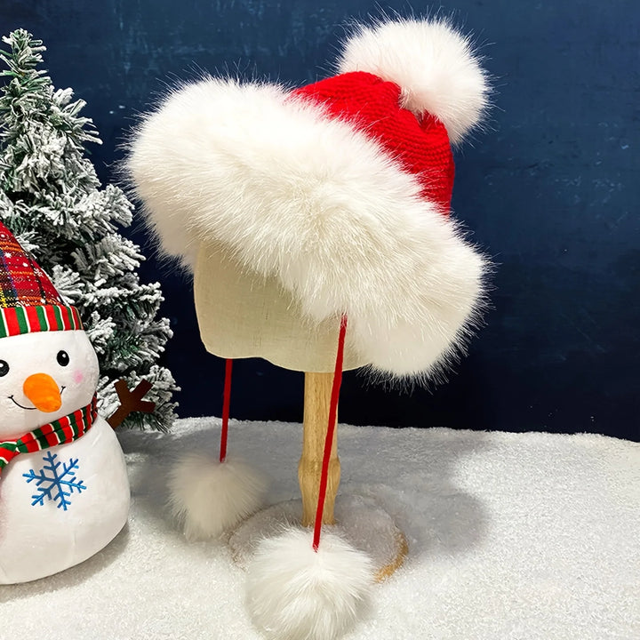 Chapeau de Noël à Pompons